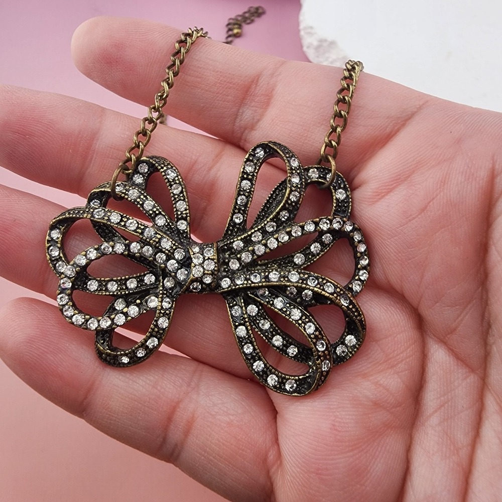 Rhinestone Bow Pendant Necklace Antique Brass Tone Statement Coquette Romantic